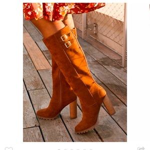 Brand new in box , Long over the knee heel boots.